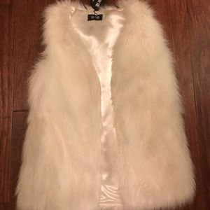white fur vest